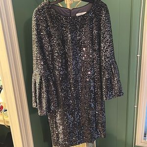 Sequined cocktail dress. Dark gray with sequins. Size 8 flared sleeves.